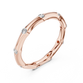 Ein handmodelliertes Wellenband mit bündig gefassten Diamantakzenten
