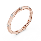 Ein handmodelliertes Wellenband mit bündig gefassten Diamantakzenten