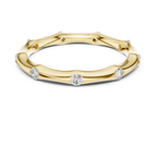 Ein handmodelliertes Wellenband mit bündig gefassten Diamantakzenten