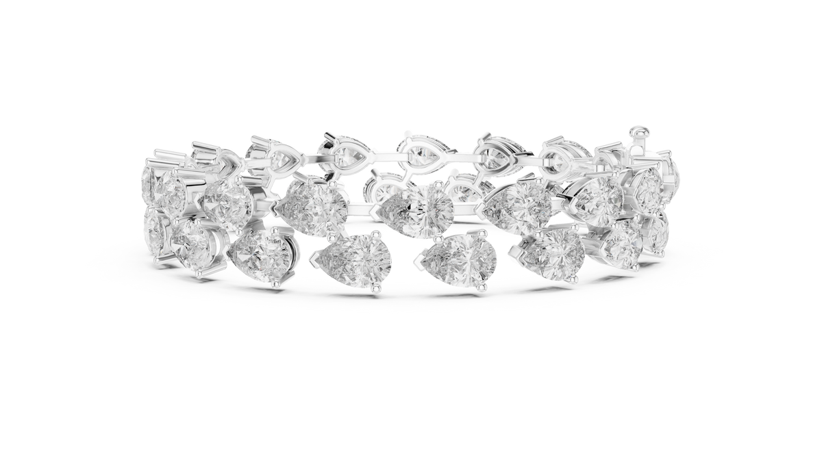 Luxuriöses Diamant-Tennisarmband mit Birnenschliff
