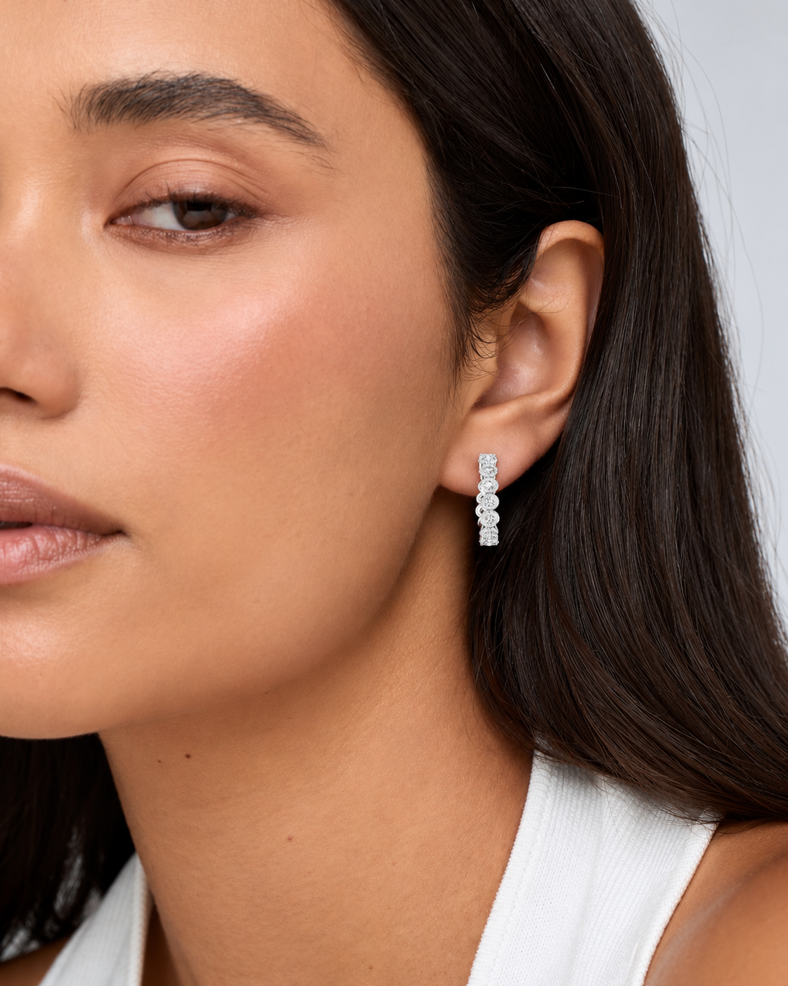 Celestria Round Diamond Linear Hoop Earrings.